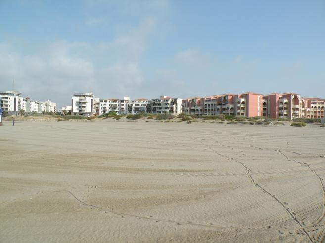  la résidence Le Sunset et la résidence Les colonnes de Circe, vues depuis la plage